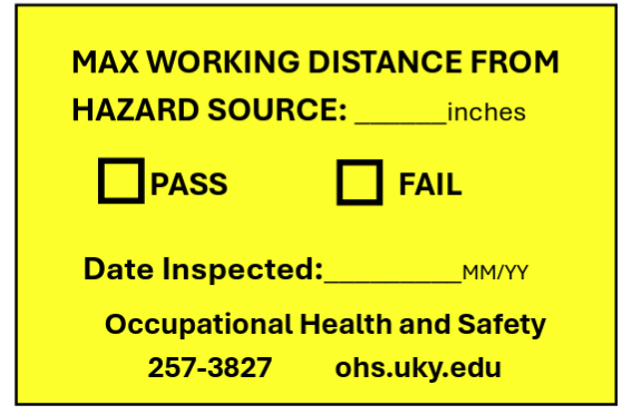 Yellow certification sticker that shows if an ECD passed or failed, the inspection date, and the maximum distance one should position the ECD from the hazard source.
